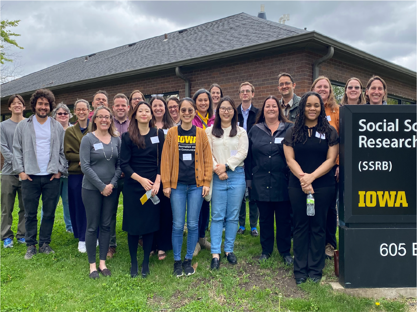 researcher affiliates stand in front of ssrb at may 2025 social