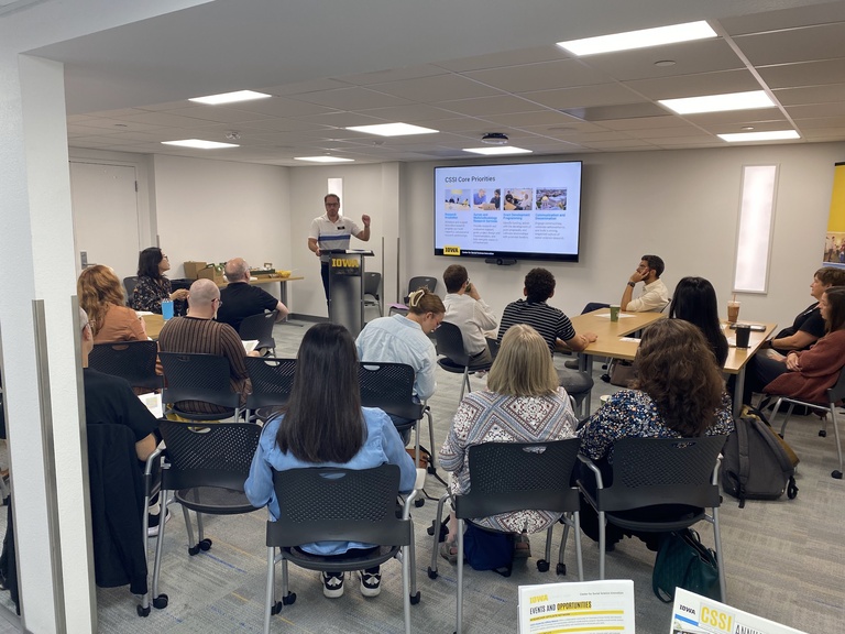 Faculty discussing research ideas