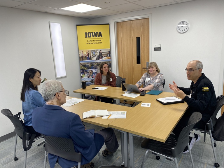 Faculty discussing research ideas