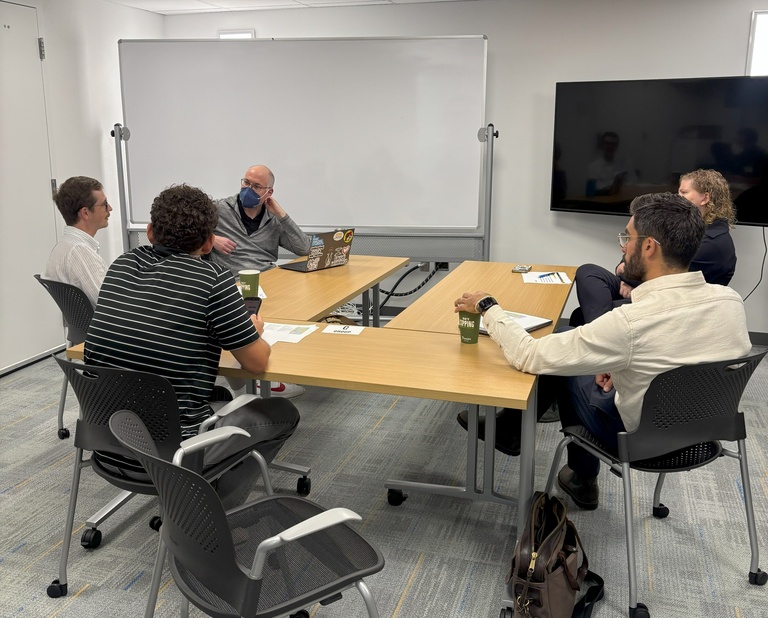 Faculty discussing research ideas