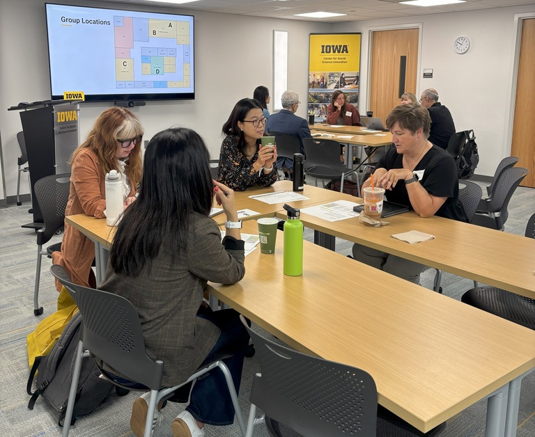 Faculty discussing research ideas
